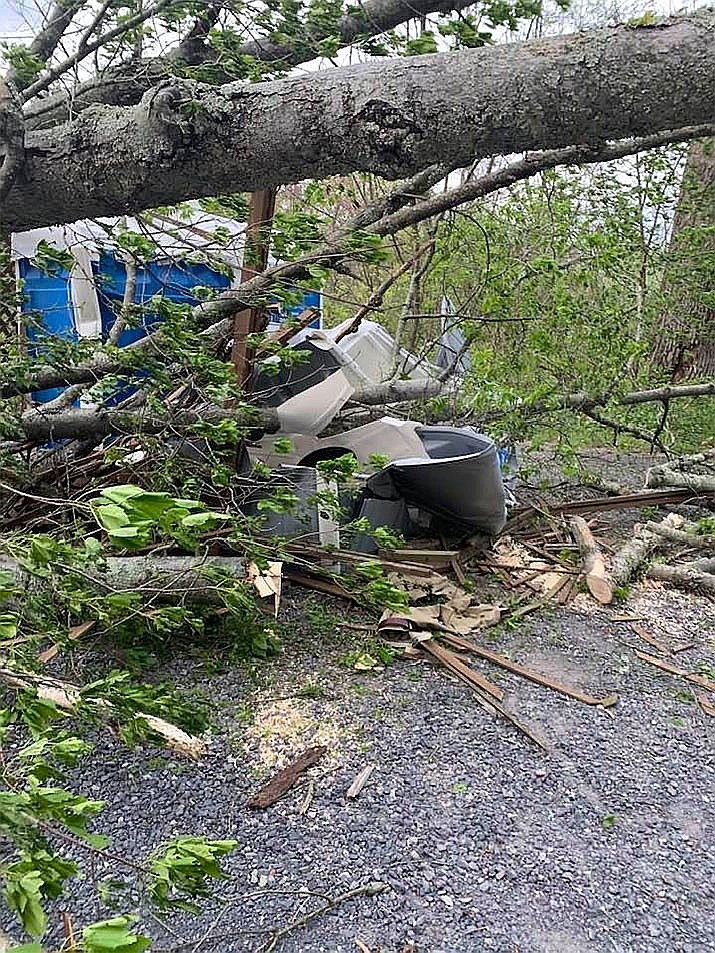 A fallen tree trapped a man inside a portable toilet at Gettysburg National Military Park. Fire crews rescued him by cutting away the tree with a chain saw then cutting the portable toilet open with another saw.(Source: Assistant Fire Chief Joe Robinson, Barlow Volunteer Fire Department via Facebook)