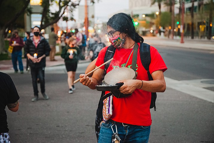 Chris Luna chants traditional hymns at a protest in Phoenix in February, when members of the group Apache Stronghold rallied on the eve of a hearing on their suit to block a copper mine that they say would destroy sacred lands at Oak Flat. (Photo Alberto Mariani/Cronkite News)