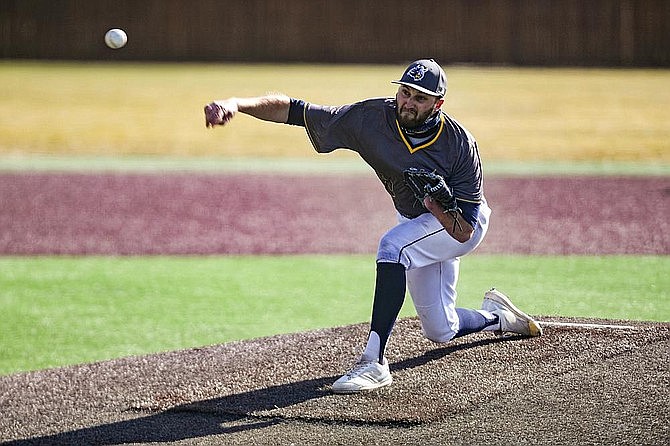 Augustana pitcher Parker Hanson throws during a baseball game against Minnesota Crookston on Tuesday, March 30, 2021 at Ronken Field in Sioux Falls. S.D. Hanson, whose prosthetic arm was stolen from his vehicle, got it back Tuesday, May 11, 2021, after it was found at a recycling plant. (Erin Bormett/The Argus Leader via AP)