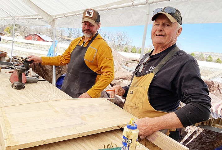 Phoenix resident Skip Peeples works on an Adirondack chair during one of Kenny New’s wine barrel furniture making classes in Camp Verde. For the past four-plus years, New has been making furniture out of wine barrels. VVN/Bill Helm