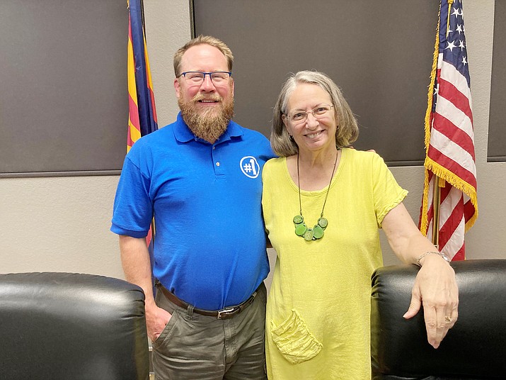 Prescott Unified School District Superintendent Joe Howard stands next to Governing Board President Deb Dillon following his annual evaluation and consideration of his contract. (Nanci Hutson/Courtesy)