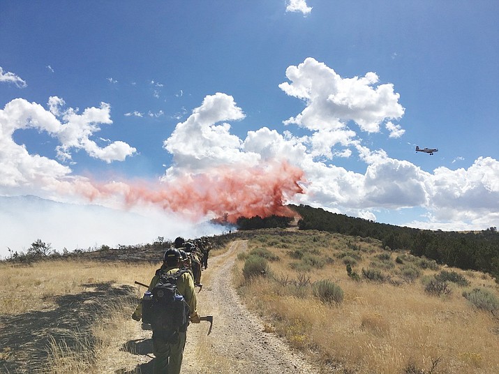 In this file 2016 photo, the Ruby Mountain Hotshots hike in to begin a fire assignment near Tooele, Utah on the Uinta-Wasatch-Cache National Forest. (Jonathon Golden/Courtesy)