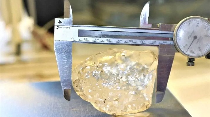 The diamond weighing 1,098.3 carats — 73 millimeters long, 52 millimeters wide and 27 millimeters thick — is the largest gem-quality diamond found in Debswana’s mines in the company’s more than 50-year history. Diamonds were discovered in Botswana in 1967 and Debswana was formed in 1969. (Photo courtesy of Debswana Diamond Company)