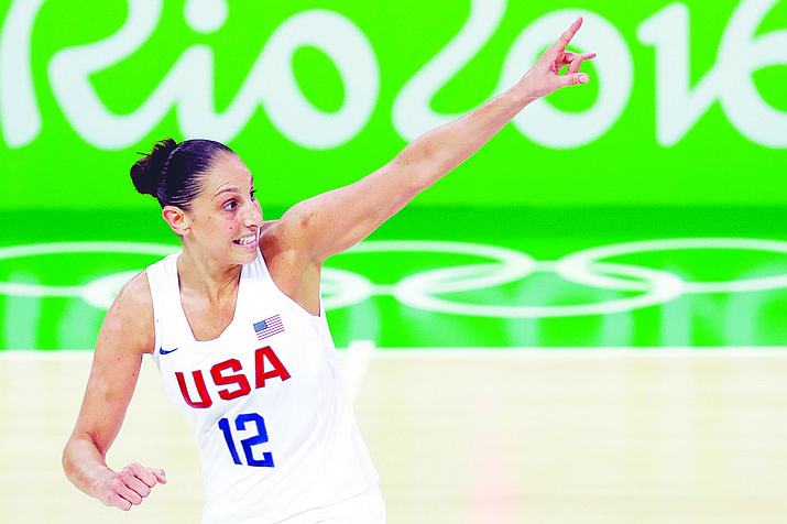 United States' Diana Taurasi, shown during the gold medal basketball game against Spain at the 2016 Summer Olympics in Rio de Janeiro, Brazil, and Sue Bird will try and become the first five-time Olympic gold medalists in basketball as they lead the U.S women's team at the Tokyo Games. (Charlie Neibergall/AP, file)