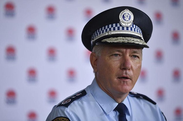 New South Wales Police Commissioner Mick Fuller speaks to media during a COVID-19 update in Sydney, Monday, June 28, 2021. Two naked men were rescued by emergency services from an Australian forest after they were startled by a deer while nude sunbathing on a beach and became lost, police say. (via AP)