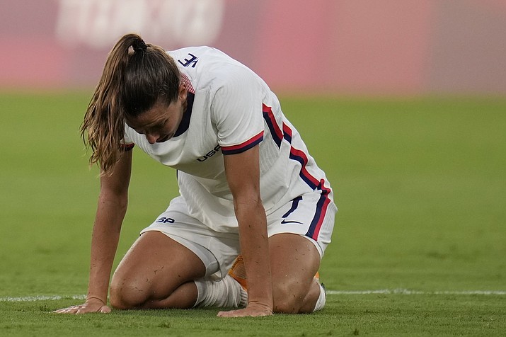United States' Tobin Heath reacts after losing 0-3 against Sweden during a women's soccer match at the 2020 Summer Olympics, Wednesday, July 21, 2021, in Tokyo. (Ricardo Mazalan/AP)