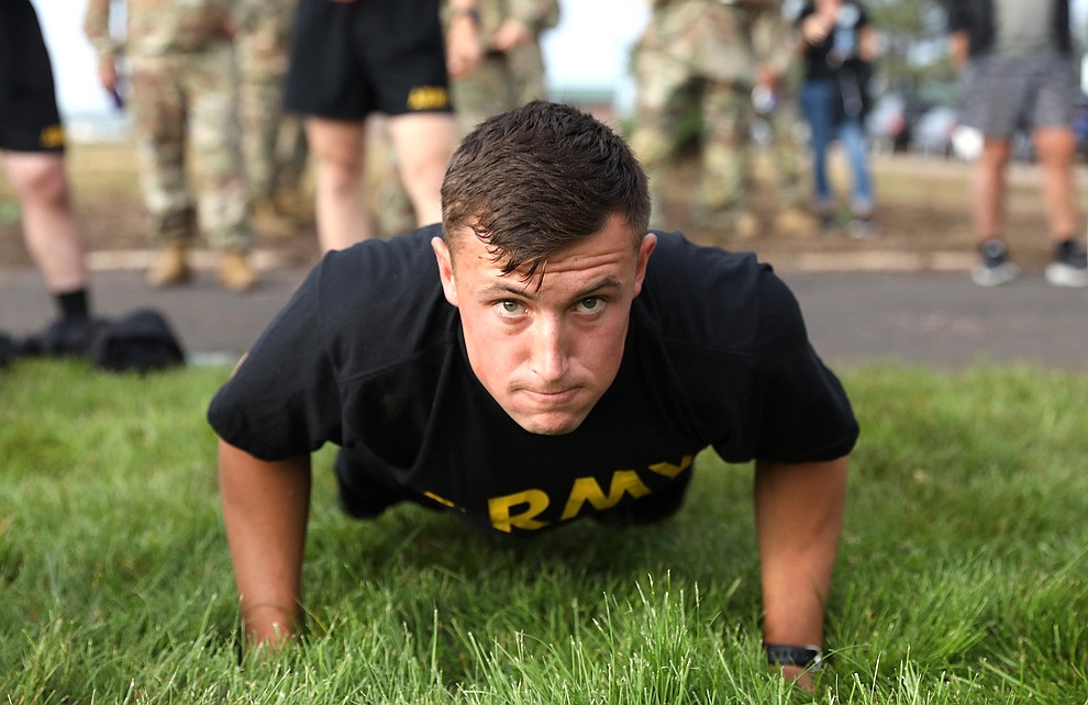 Spc. Aiden Carroll, with 133rd Engineer Company, Wyoming National Guard, focuses as he conducts pushups during the physical fitness assessment of the 2021 Army.National Guard Best Warrior Competition at Camp Navajo, Arizona, July 20, 2021. The competition spans three physically and mentally demanding days where competitors are.tested on a variety of tactical and technical skills as they vie to be named the Army Guard’s Soldier and Noncommissioned Officer of the Year. The winners then represent the Army.Guard in the Department of the Army Best Warrior Competition later this year.