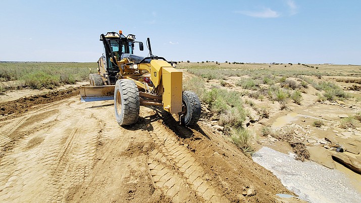 Repairs continue along Navajo Route 91 after monsoon rains July 25. (Photos/Office of the Navajo President)