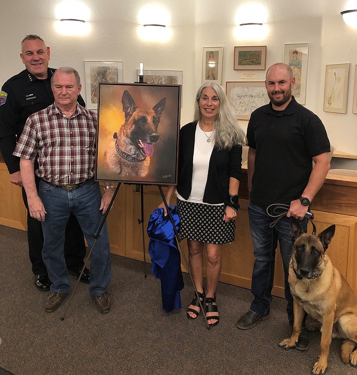 Chief Charles Husted, Robert Albrecht, City of Sedona Arts and Culture Coordinator Nancy Lattanzi, and Handler Officer Jonathan Reed with Max. (City of Sedona/Courtesy)