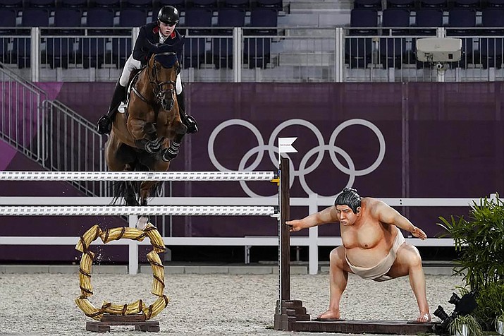 Britain's Harry Charles, riding Romeo 88, competes during the equestrian jumping individual qualifying at Equestrian Park in Tokyo at the 2020 Summer Olympics, Tuesday, Aug. 3, 2021, in Tokyo, Japan. (Carolyn Kaster/AP)