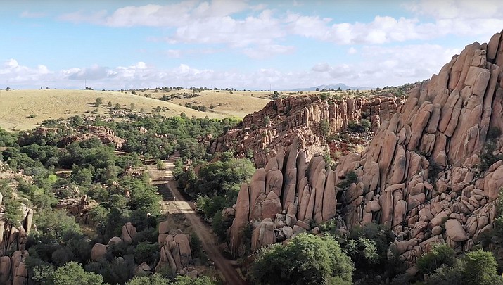 The long-discussed 475 acres of prime land in the heart of the Granite Dells is now the property of the City of Prescott after two Arizona Eco Development land transactions closed escrow Tuesday afternoon, Aug. 24. The land is near the iconic Point of Rocks, shown here. (Courier file photo)