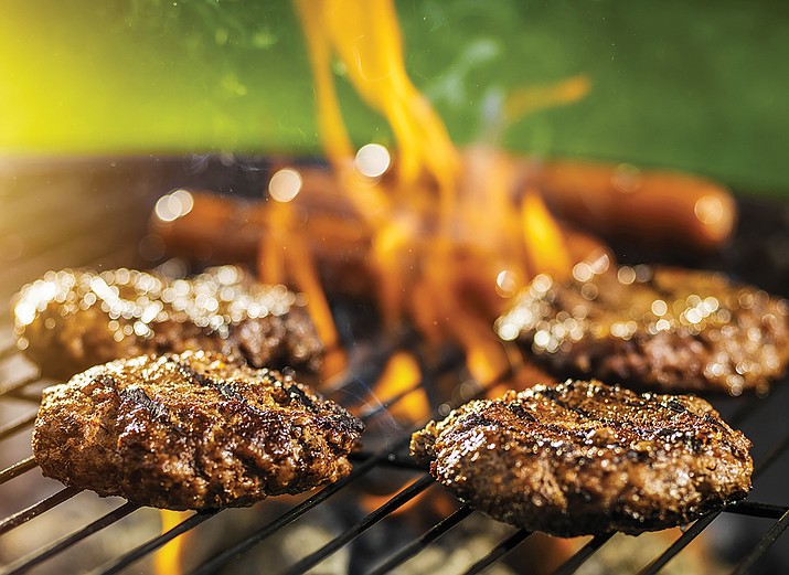 Backyard barbecues mean grilling, and grilling means juicy burgers. (Metro)