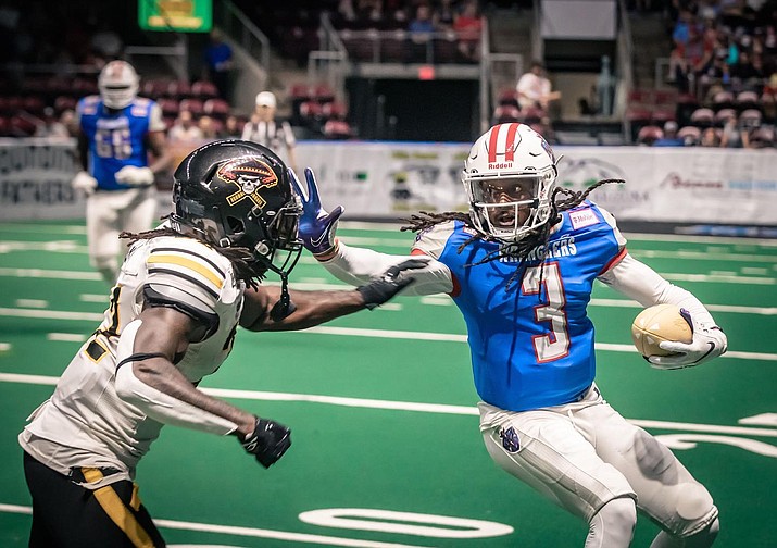 Northern Arizona Wranglers quarterback Verlon Reed Jr. (3) attempts to evade the tackle during a game against the Tucson Sugar Skulls on Saturday, Aug. 21, 2021, at the Findlay Toyota Center in Prescott Valley. (NAZ Wranglers/Courtesy)