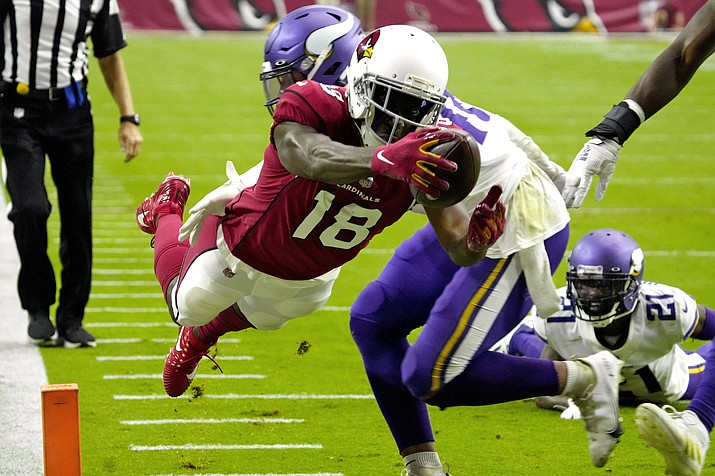 Arizona Cardinals wide receiver A.J. Green (18) dives into the end zone for a touchdown against the Minnesota Vikings during the second half of a game, Sunday, Sept. 19, 2021, in Glendale. (Rick Scuteri/AP)