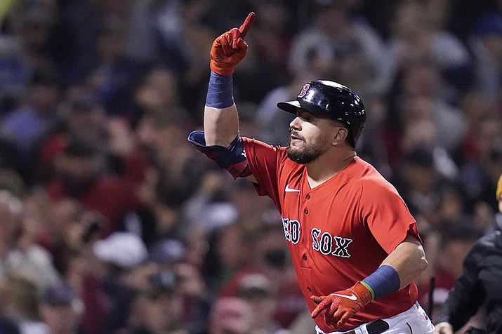 Boston Red Sox's Kyle Schwarber celebrates his solo homer in the third inning of an American League Wild Card playoff baseball game against the New York Yankees at Fenway Park, Tuesday, Oct. 5, 2021, in Boston. (Charles Krupa/AP)