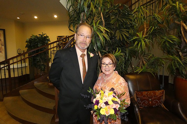 On Saturday, Oct. 2, two Alta Vista employees were married at the senior living community located at 916 Canterbury Lane in Prescott. 
Carolyn Kearley is a receptionist, and Jim Beery is a driver for Alta Vista. When they started working together, it seemed they had some communication issues, and did not really get along too well. But, their positions are so important, especially on appointment days at the community, that they had to work through some things, becoming patient and speaking with kinder tones to one another. 
Fast forward to November 2020. Carolyn and Jim were able to work out their “communication issues” and in fact, communication was now excellent! So excellent that they fell in love and planned to marry in 2021. 
The staff of Alta Vista worked alongside both of the lovebirds to make sure this day was memorable. They of course wanted to get married at Alta Vista, where residents and staff could all be a part of their special day! Residents and staff always say they are a family, and looks like this gets more true every day! (Courtesy)