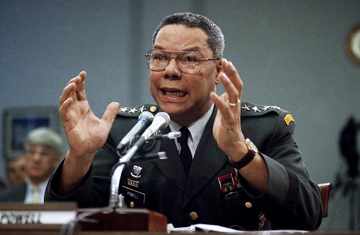 In this Sept. 25, 1991 photo, Gen. Colin Powell, chairman of the Joint Chiefs of Staff, speaks on Capitol Hill in Washington, at a House Armed Services subcommittee. Powell, former Joint Chiefs chairman and secretary of state, has died from COVID-19 complications. In an announcement on social media Monday, the family said Powell had been fully vaccinated. He was 84. (Marcy Nighswander/AP, File)