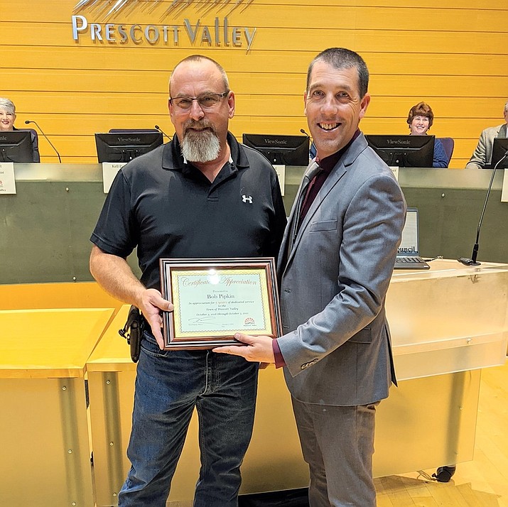 Prescott Valley Community Development Inspector Bob Pipkin was honored by the Town Council on Oct. 14, 2021, for five years of service to the town. Pictured with him is Mayor Kell Palguta. (Courtesy)
