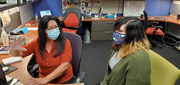 Mary Grace Pewewardy (right) with Patty Talahongva, executive producer of Indian Country Today newscast) in the office where Peweardy is an intern. (Submitted photo)