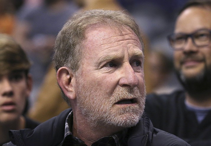 In this Dec. 11, 2019 photo, Phoenix Suns owner Robert Sarver watches the team play against the Memphis Grizzlies during the second half of an NBA basketball game in Phoenix. The Suns released a statement regarding a potential media investigation into the workplace culture of the franchise, denying that the organization or Sarver has a history of racism or sexism. (Ross D. Franklin/AP, File)