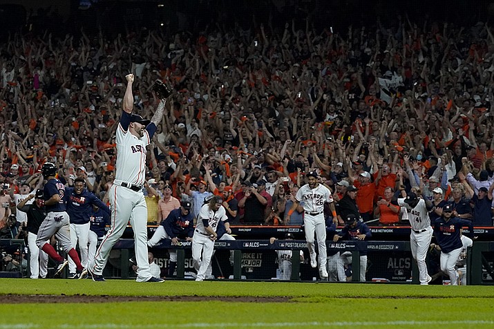 Houston Astros pitcher Ryan Pressly celebrates their win against the Boston Red Sox in Game 6 of baseball's American League Championship Series Friday, Oct. 22, 2021, in Houston. The Astros won 5-0, to win the ALCS series in game six. ( David J. Phillip/AP)