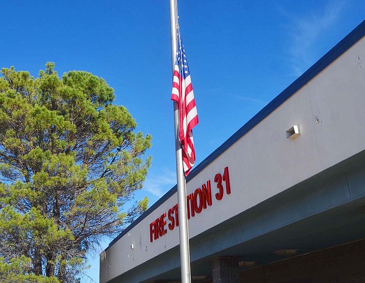 The flag flies at half-staff in front of the Verde Valley Fire District building off State Route 260 in Cottonwood on Friday, Oct. 22, 2021. VVFD Firefighter Tyrone Bell died in a line of duty Monday, Oct. 18, after he succumbed to COVID-19 complications. Bell came into contact with a COVID-positive patient while on duty, according to VVFD Chief Danny Johnson. (Vyto Starinskas/Independent)