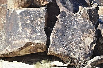 This undated file photo shows the petroglyphs of Grapevine Canyon just outside of Laughlin, Nevada, near the Arizona state line. The Fort Mojave Indian Tribe is working to establish the Avi Kwa Ame National Monument to protect thousands of acres of land that include petroglyphs. (Julie Fairman/Mohave Valley Daily News via AP)