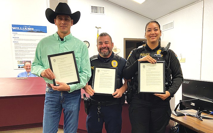 Williams Fire Inspector Jason Moore, Officer Daniel Ortiz and Officer Grace Dash were recognized in front of the Williams City Council for their life-saving efforts last month. (Wendy Howell/WGCN)