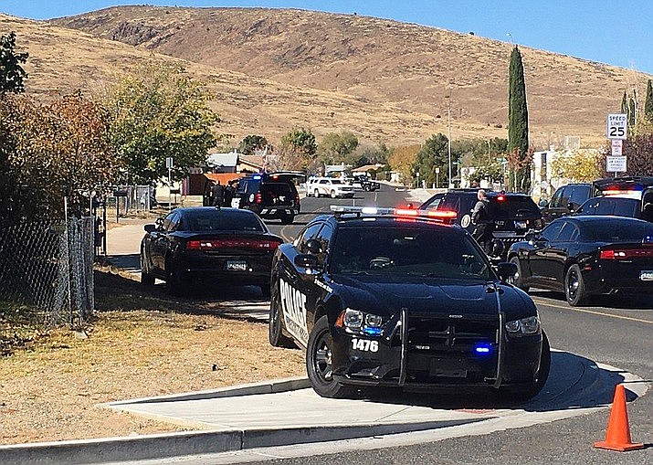 Prescott Valley Police have shut down the area of the 6400 block of Sunset Lane and Date Creek Drive, where a man is in a home with a weapon. (Jim Wright/Courier)