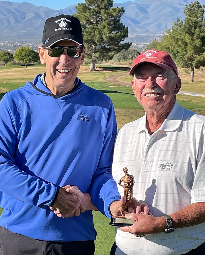 Verde Santa Fe Men’s Golf Club President Mike Botelho, left, congratulates Norm Newell on his recent President’s Cup victory Oct. 22, 2021. The two-day, 36-hole event took place Oct. 15 and Oct. 22. (Brian Stanley/Courtesy)