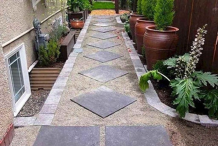 A walkway with pavers can enhance a sideyard. (Ken Lain/Courtesy)