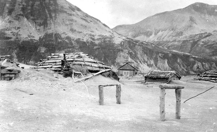 This June 1912 photo shows ash drifts around Katmai village's then-new Russian Orthodox church after the eruption of Novarupta Volcano in Katmai National Park and Preserve in Alaska. An unusual alert was issued by volcano scientists Wednesday, Nov. 17, 2021, warning that an ash cloud was headed toward Alaska’s Kodiak Island. The ash is from the powerful 1912 eruption of Novarupta, a volcano on the Alaska Peninsula that dropped volcanic ash that is still visible today. (G.C. Martin/U.S. Geological Survey via AP, File)