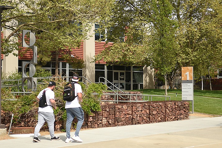 Two prospective students walk around the Yavapai College campus on May 4, 2021. (Jesse Bertel/Courier)