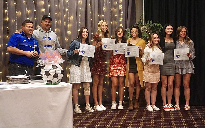 The junior class of Chino Valley girls soccer and head coaches stand together for a photo with their awards during the team’s end-of-season banquet on Thursday, Nov. 18, 2021, at Prescott Vibes. (Aaron Valdez/Review)
