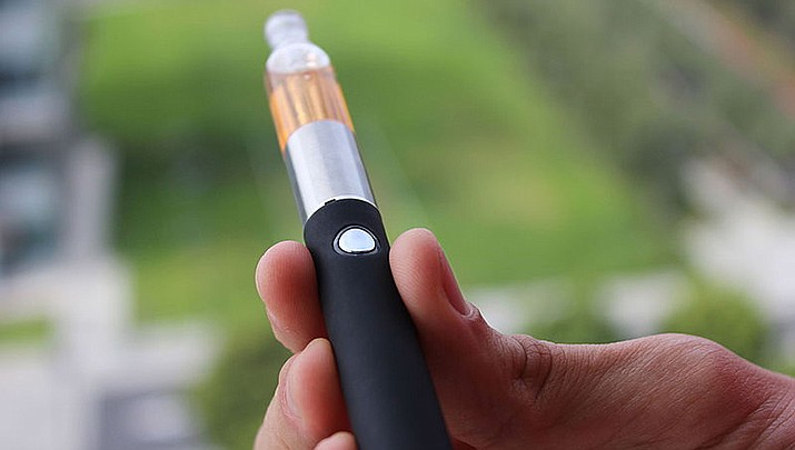 E-cigarette giant Juul Labs will pay Arizona $14.5 million and vowed not to market to young people in the state to settle a consumer fraud lawsuit. (Photo by Lindsay Fox, cc-by-sa-2.0, https://bit.ly/3r5nS9t)