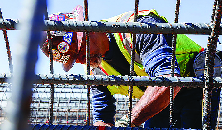 Job growth was experienced in almost every area of the economy as the employment picture continued to improve in Arizona, including the construction sector which grew a scant 1.3% over the last year. The biggest increases were in leisure and hospitality jobs, which grew 17.6% as the sector bounced back from pandemic shutdowns, helping drive the drop in unemployment. (File photo by Jenna Miller/ Cronkite News)