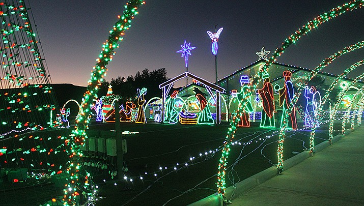 The annual holiday light display at the Preston household in Kingman will continue nightly through Jan. 1. (Photo by MacKenzie Dexter/Kingman Miner)