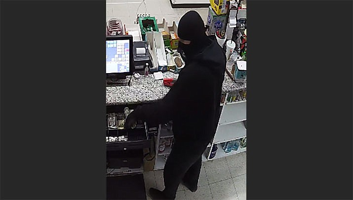 Kingman police are requesting the public’s help in identifying this suspect involved in an armed robbery in Kingman on Friday, Nov. 26. (Photo courtesy of KPD)