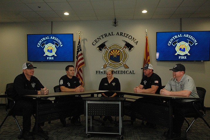Central Arizona Fire and Medical Authority captains from left, Rob Duplessis, Brett Poliakon, Administration Manager Susanne Dixson, captain Rick Olson and Battalion Chief Brad Davis. (Doug Cook/Courier)