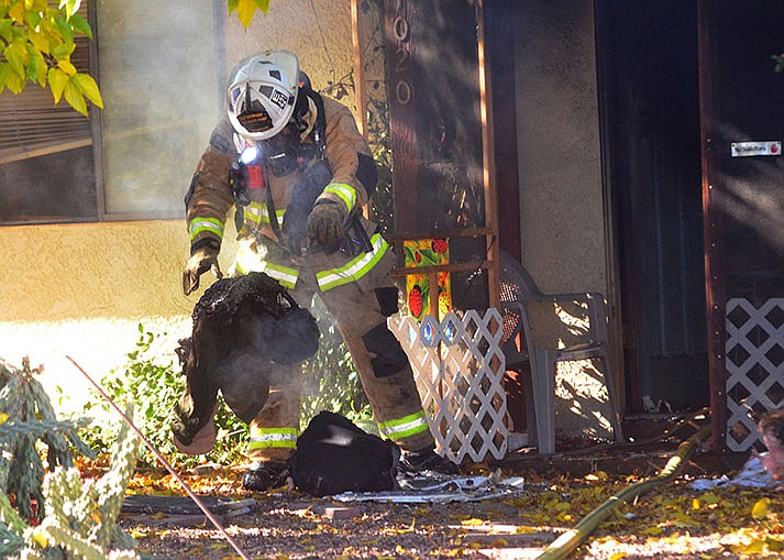 Cottonwood and Verde Valley Fire departments combined efforts at a fire on Fourth Street in Cottonwood on Tuesday, Nov. 30, 2021. (Verde Independent/Vyto Starinskas)