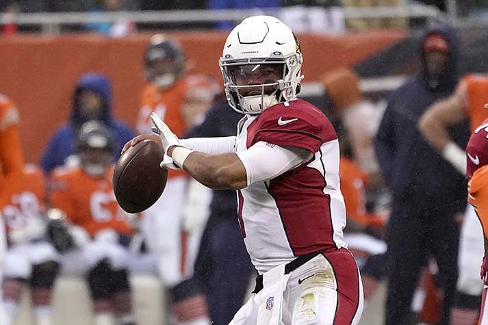 Arizona Cardinals quarterback Kyler Murray passes during the first half of an NFL football game against the Chicago Bears Sunday, Dec. 5, 2021, in Chicago. (AP Photo/Charles Rex Arbogast)
