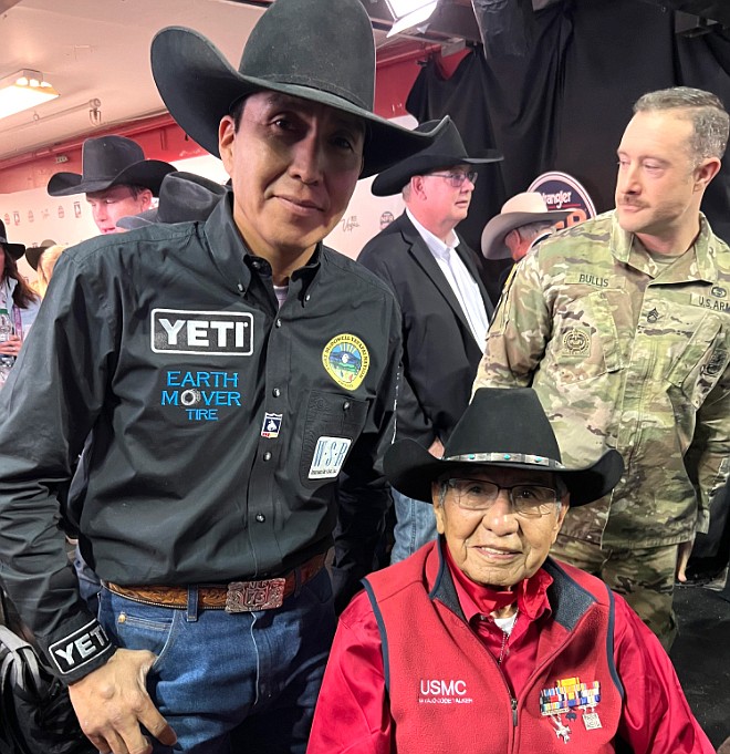 U.S. Marine and Navajo Code Talker Association President, Peter MacDonald, joins 9-time NFR qualifier Derrick Begay in an honoring ceremony Dec. 11 during the 2021 National Finals Rodeo in Las Vegas, Nevada. (Photo/Navajo Nation Council)