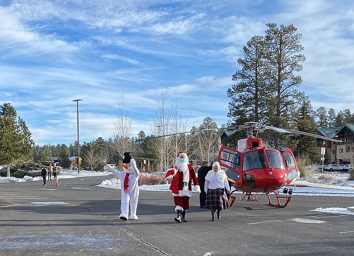Grand Canyon School students and children from Kaibab Learning Center enjoyed a special visit with Santa during a Santa Fly-In at Best Western Premier Grand Canyon Squire Inn Dec. 16. (Submitted photos)