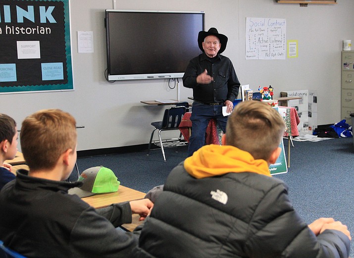 Former Arizona State Historian Marshall Trimble shares stories with students at Ash Fork High School Dec. 15.  (Loretta McKenney/WGCN)