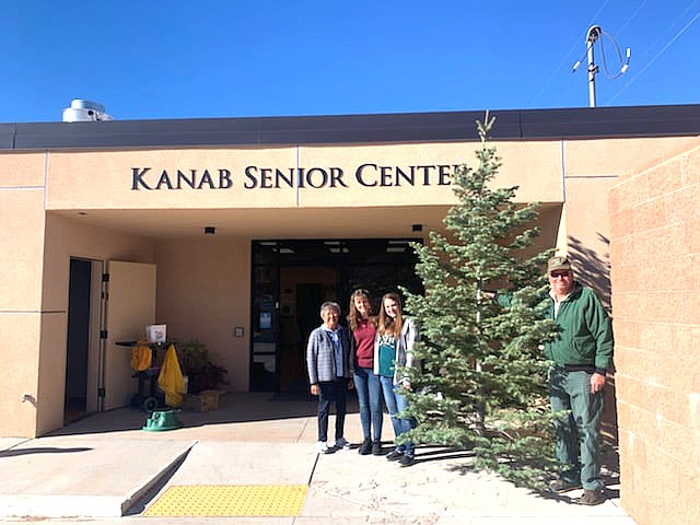 Forester Paul Callaway of Kaibab National Forest, delivers a Christmas tree to the Kanab Senior Center. (Photos/KNF)