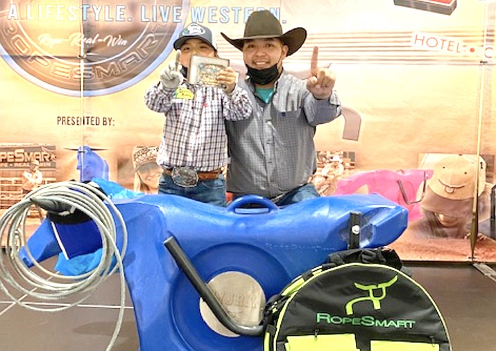 Klay Tohsonii and his father Nicholas Benward attend the 2021 NFR in Las Vegas, Nevada Dec. 9. (Photos courtesy of the Office of the Navajo Nation President and Vice President)
