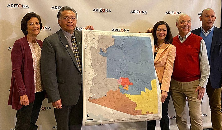Members of the Arizona Independent Redistricting Commission with newly adopted map of Congressional districts. (Courtesy)
