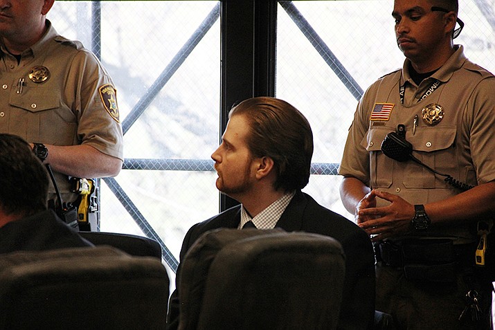 Kenneth Wayne Thompson listens as a Yavapai County Superior Court clerk reads the verdict reached by the jury in his murder case Wednesday, April 3, 2019. Thompson died in prison by apparent homicide Dec. 29, 2021. (Courier file photo)