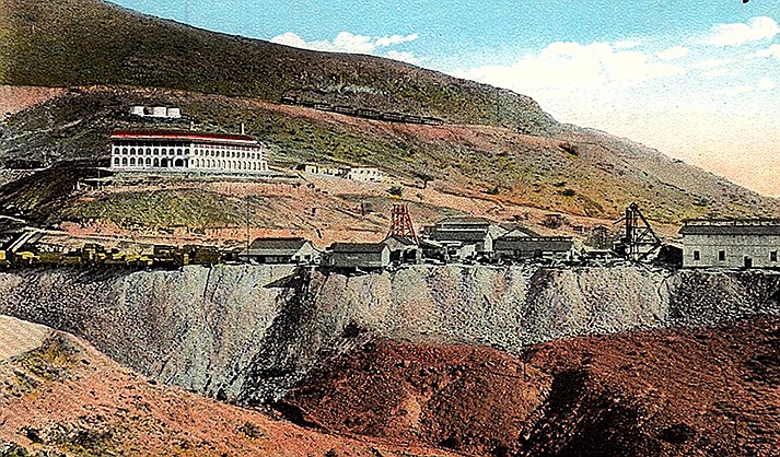 The Little Daisy Hotel and some homes for executives were constructed above the industrial buildings of the United Verde Extension Mining Company where the Audrey Shaft Headframe and the Edith Shaft Headframe are the tallest structures. High on the hill the train is traveling toward Jerome.