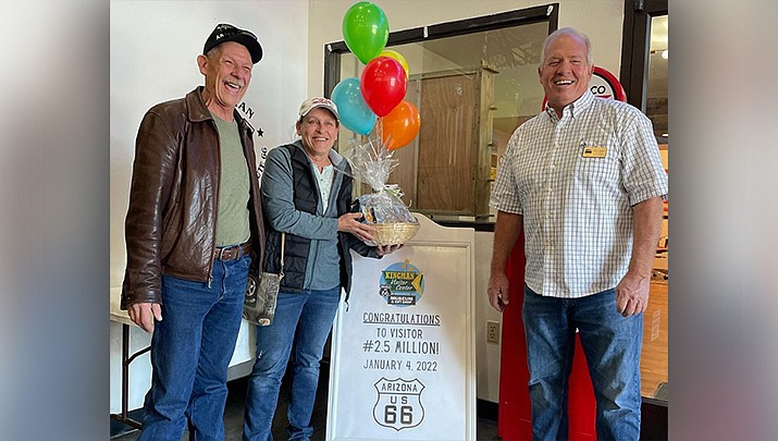 Kristin Kodrack, middle, of Waldport, Oregon, was the 2.5 millionth visitor at the Kingman Visitor Center. She received a gift basket. (Courtesy photo)
